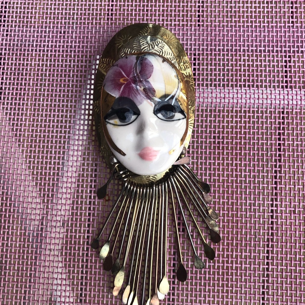 Artisan made hp porcelain face with metal fringe brooch signed